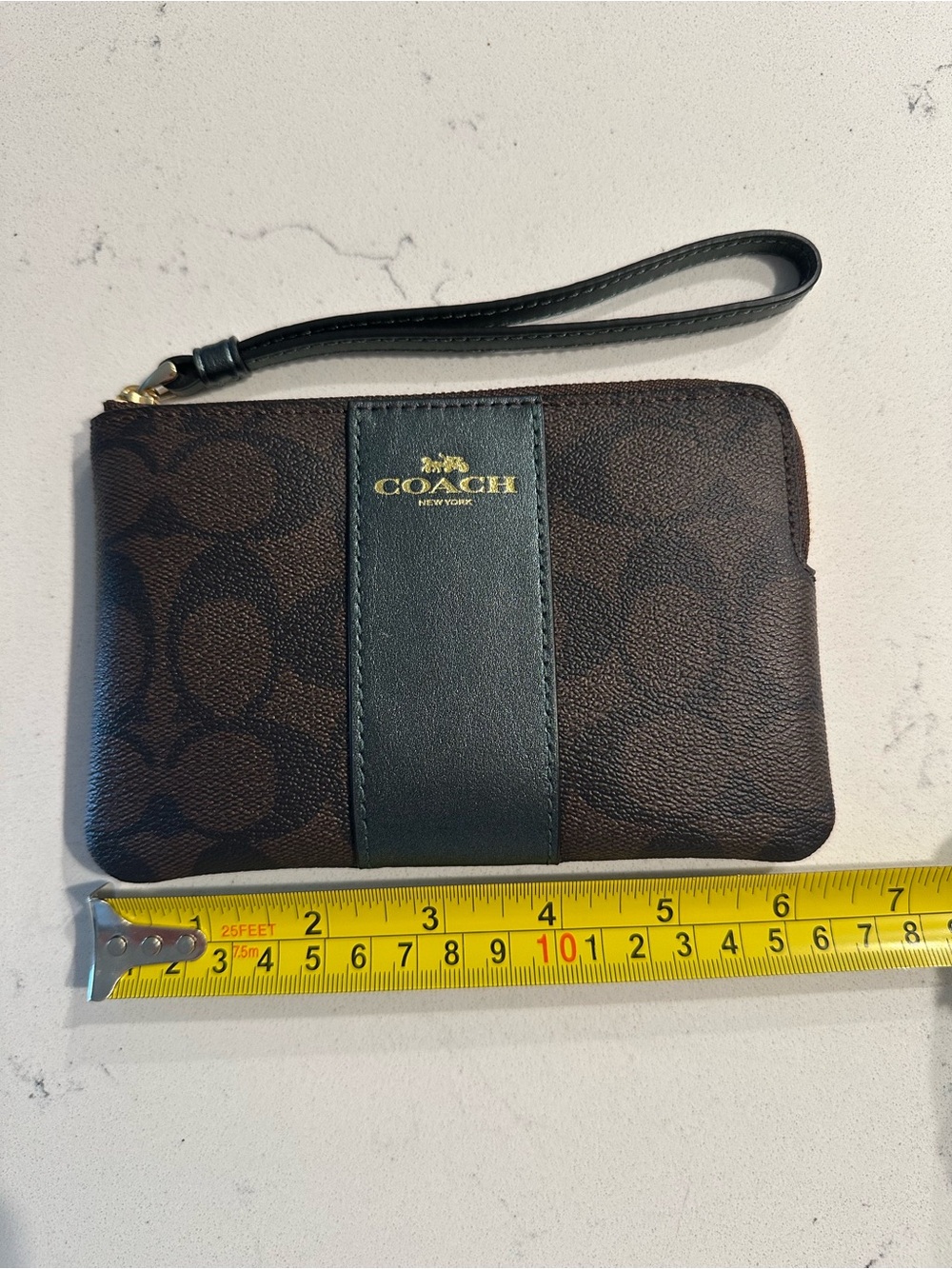 Coach Corner Zip Signature Wristlet with metallic green